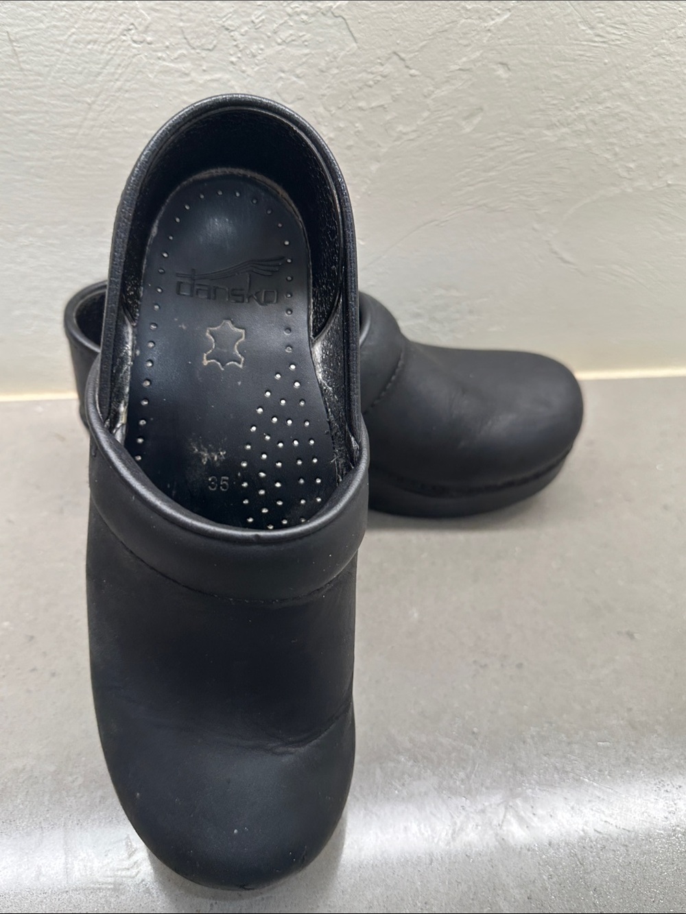 Dansko Black Slip-On Women's Clogs